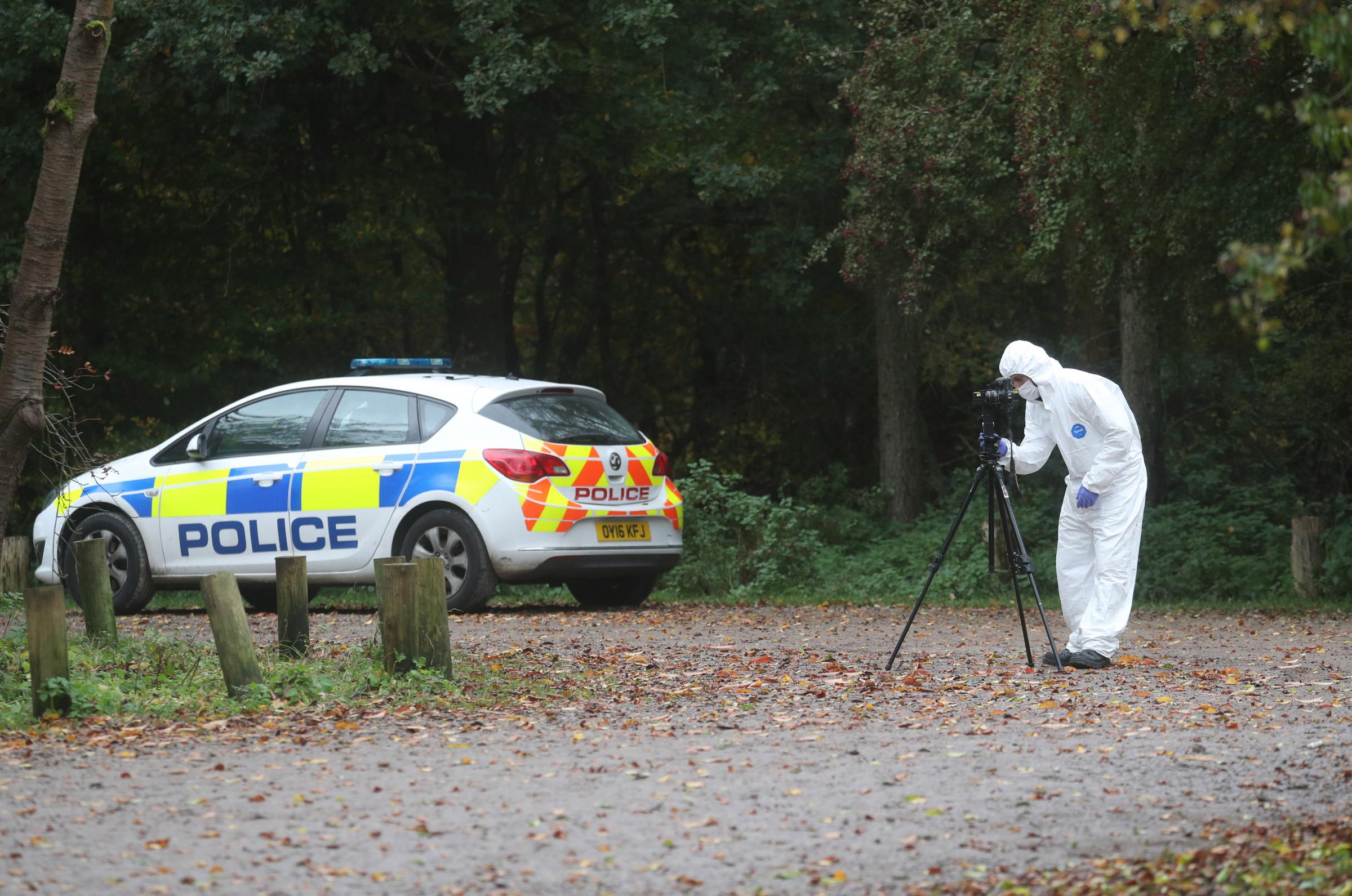 Forensic investigators at Watlington Hill in Oxfordshire after the body of a woman was discovered at the National Trust estate